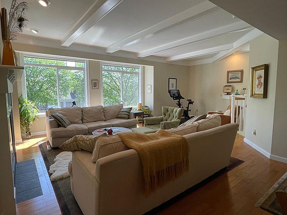 Another angle of the living room and Peloton in the back of the room.