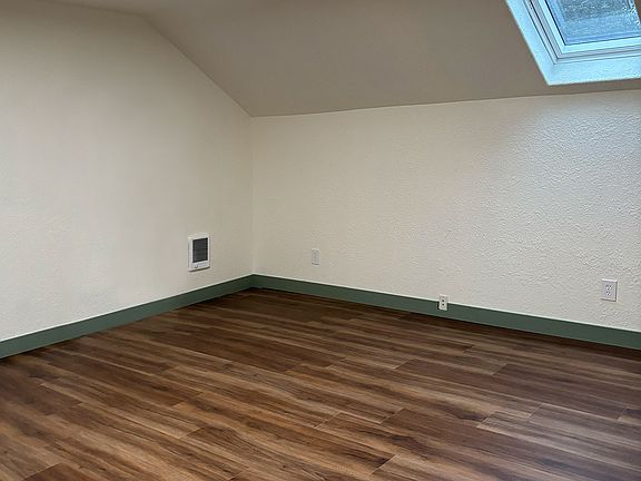 Bedroom with fully-openable skylight (approved fire safety egress).
