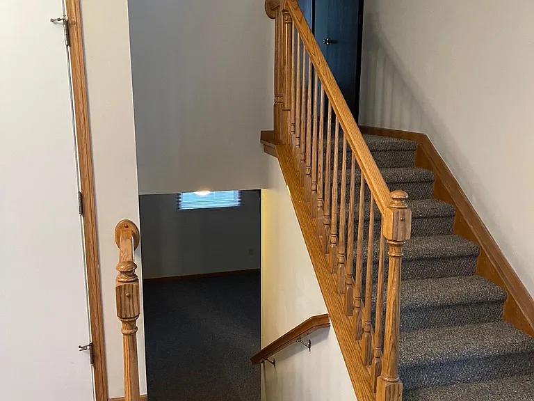 Stairs to the upper and lower levels