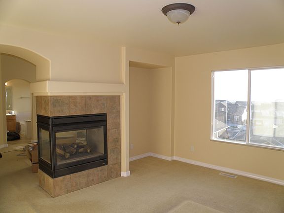 Living room with double sided fireplace!