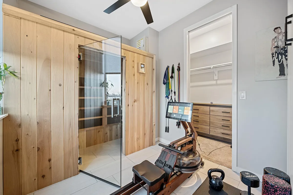 Our wellness room is equipped with a custom 2 person sauna, Ergatta water row machine, resistance bands, weights, foam rollers, a yoga mat, and jump rope to help you keep your fitness commitments while traveling. This is the ultimate relaxation room. - W 47th Ave