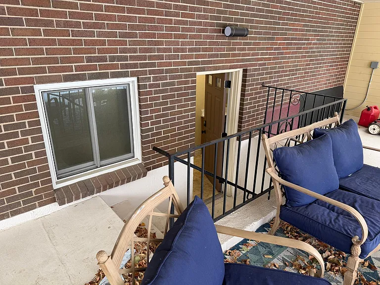 Covered patio entrance into the unit