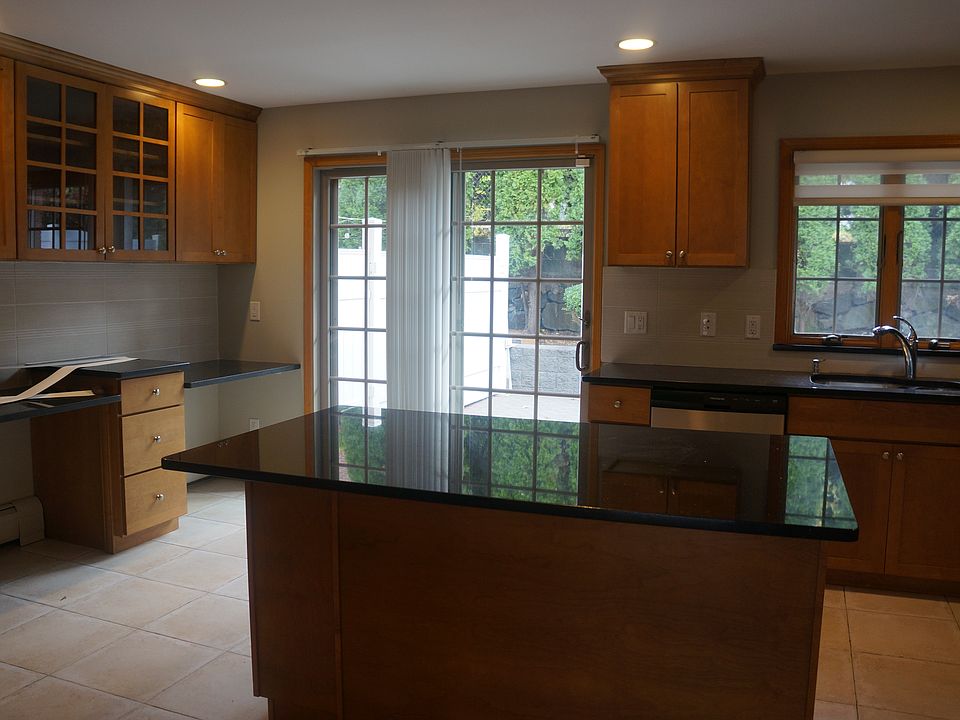 Kitchen with sliding door leading to yard