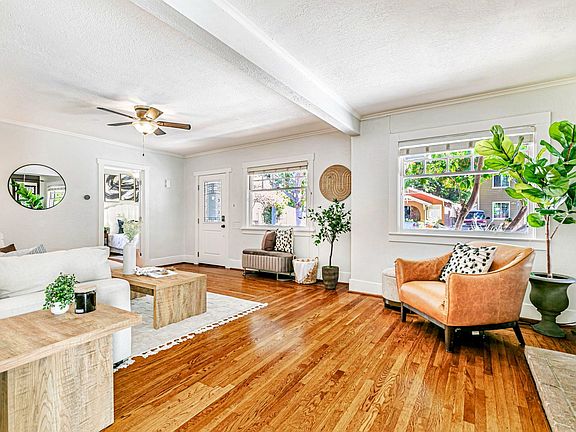Lots of natural light, hardwood floors and ceiling fan (and central A/C).