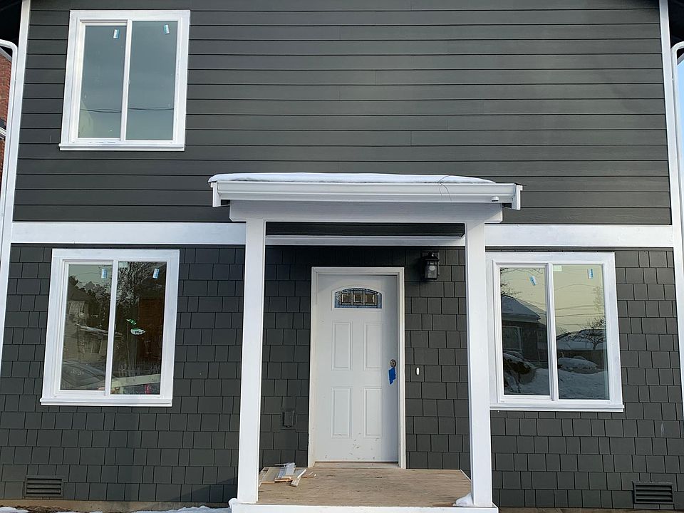 Landscaping and walk ways being completed soon. Front door will be painted red.