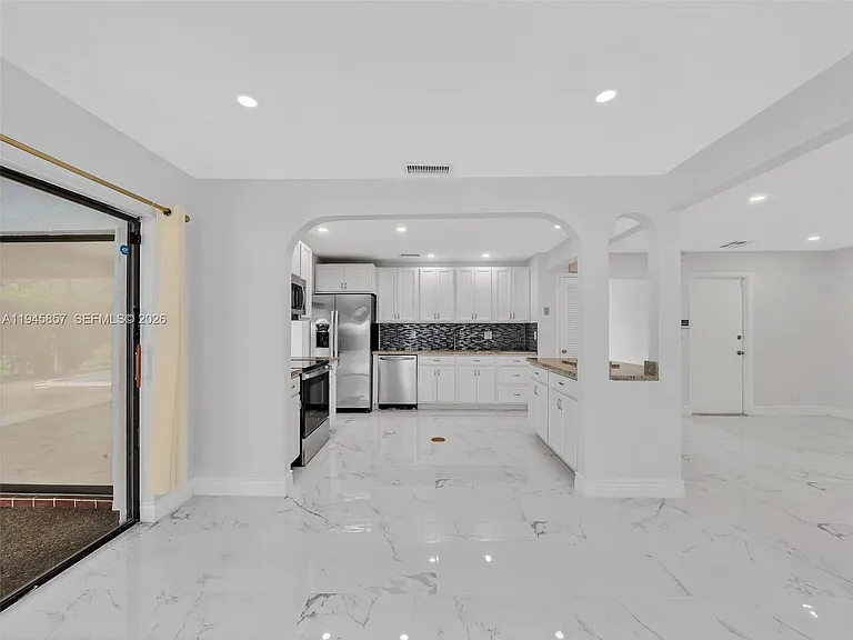 10251 NW 39th Ct — Photo 36