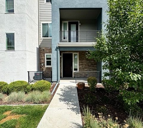 Front of home which faces south. Covered patio, groundskeeping free.