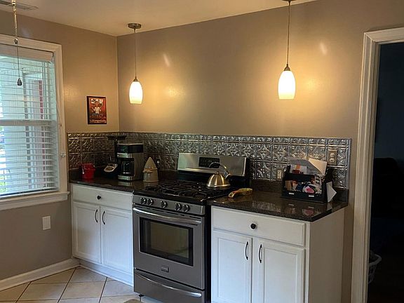 5 burner gas stove, tin backsplash, new cabinets