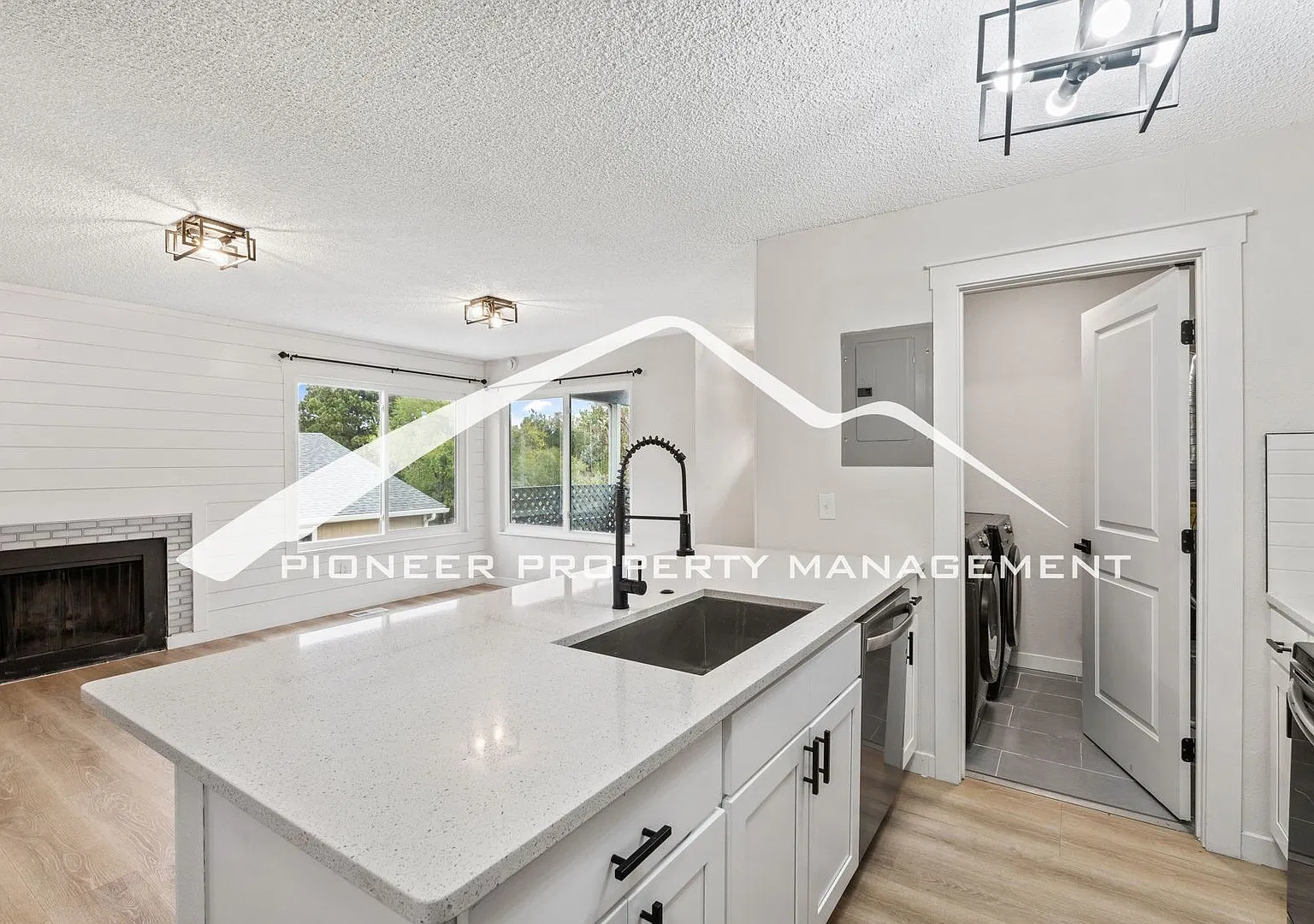 Remodeled 2 Bedroom Condo with Covered Parking, In Unit Laundry, AC and Private Storage — Photo 4