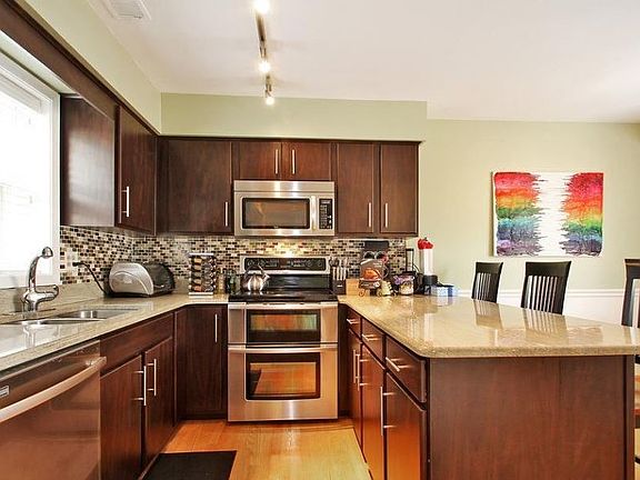 Recently updated with tasteful granite counter tops and stai
