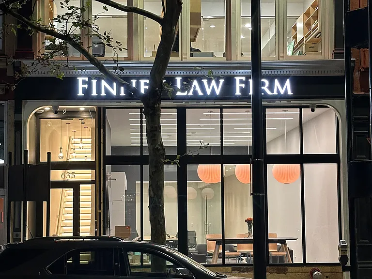 Suites are on 3rd/4th floors above law firm