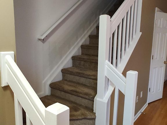 Up the Stairs just inside Front Door