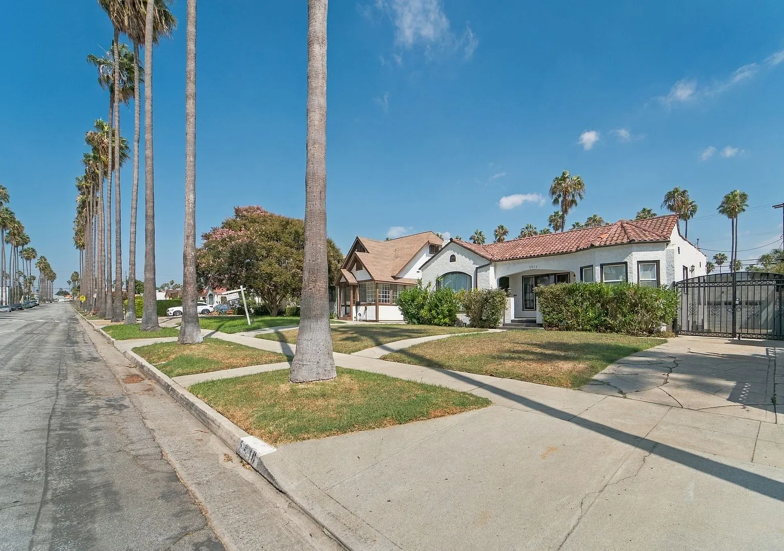 Classic Spanish-Style Single-Family Home with Hardwood Floors & Private Backyard — Photo 2