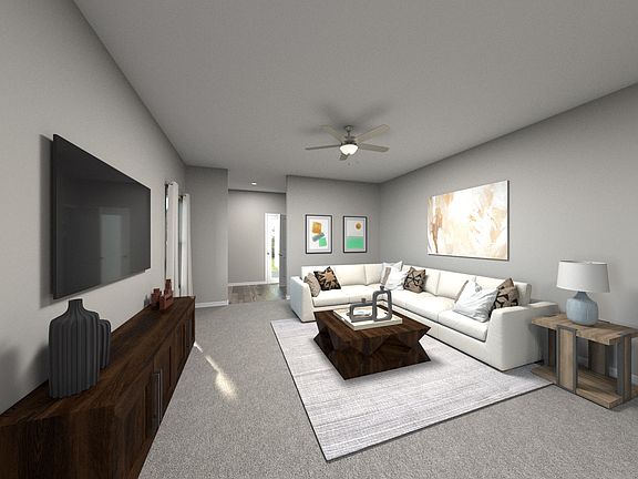 Kick your feet up after a long day in your cozy living space.