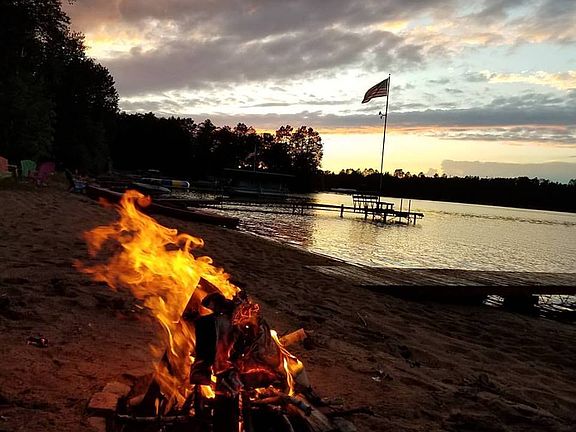 Beach fire pit at dusk