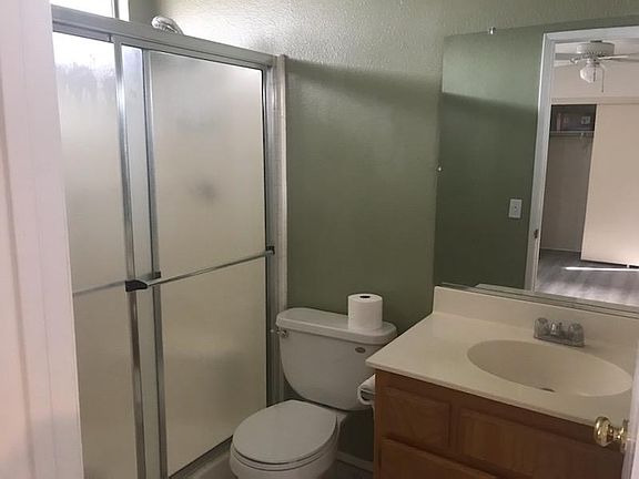 Master bath with floor to ceiling linen closet