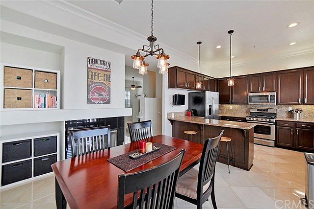 Open Kitchen & Dining Room with Recessed Lighting, Upgraded Light Fixtures & Crown Molding