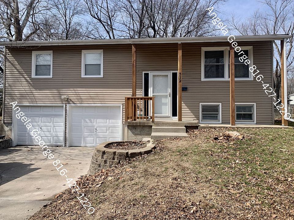New cedar beams and hand rail on porch.
