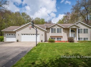 1959 Rogue River Rd NE, Belmont, MI 49306