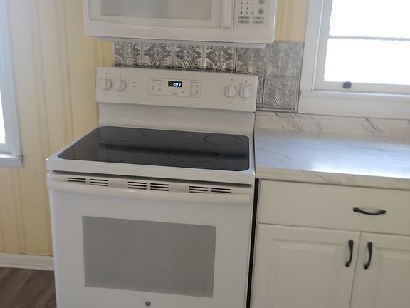 Stove 
Beautiful backsplash