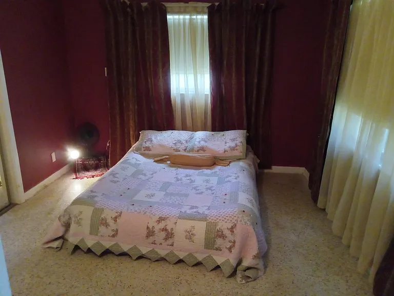 One Master bedroom off the bathroom, just 3 steps away. This is an queen size air mattress on the floor, But it gives you an idea of the space.