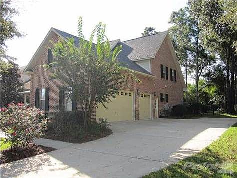 3 car over sized garage with single exit door to extended driveway.