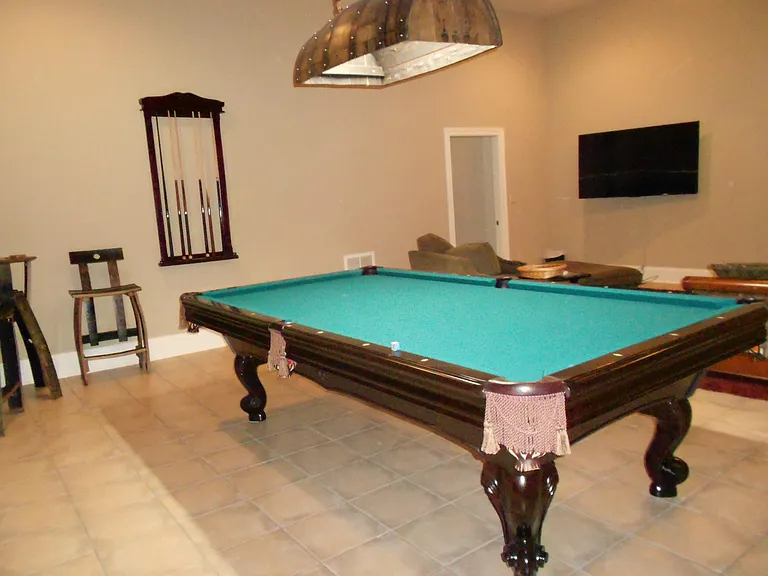 Gameroom with pool table.