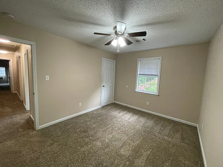 Bedroom 3 is spacious with a large closet