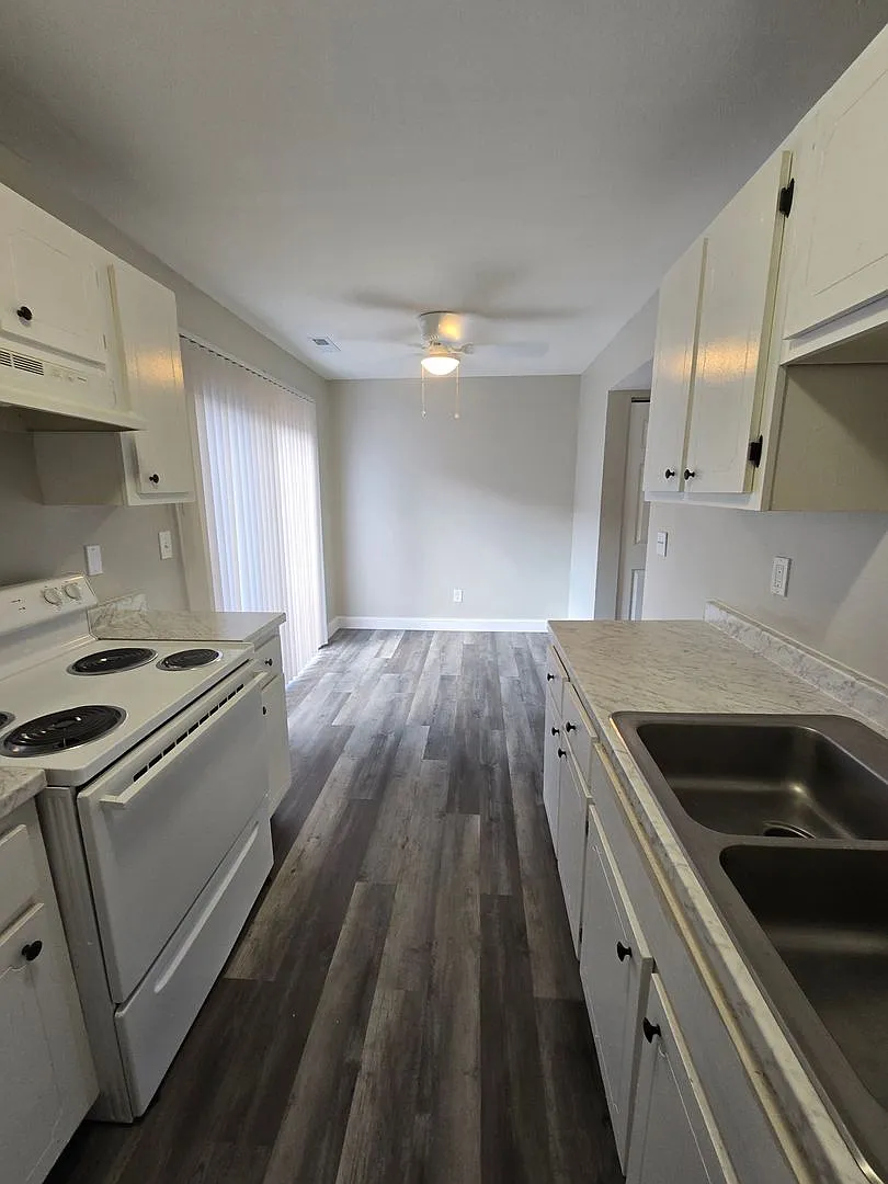 3223 Town and Country Apartments — Photo 1