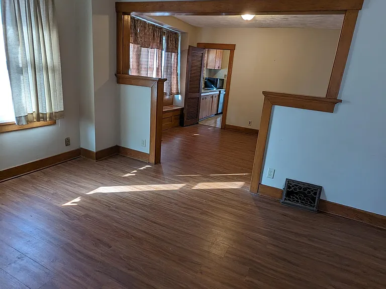 Living room looking into dining room & kitchen