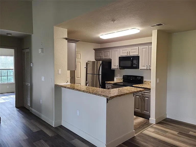 8911 Manor Loop #205 — Photo 6