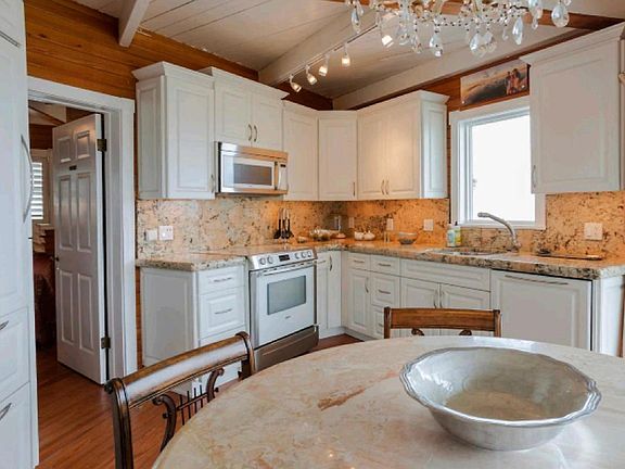 Kitchen with Subzero built in fridge and freezer, Bosch range, dishwasher and mircrowave