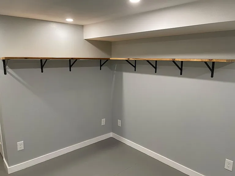 Large amount of oil rubbed wood and steel shelves reduce and simplify your furniture needs
