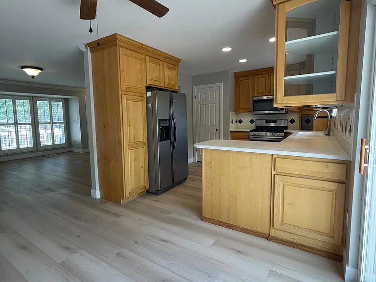 dining room area looking into kitchen.