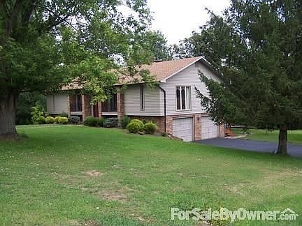 House from the corner of the property
						:
						The house is on the corner of a cul-de-sac.