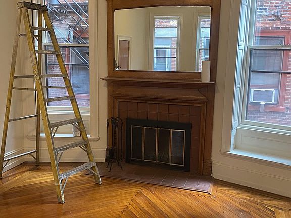 Living with wooden fireplace