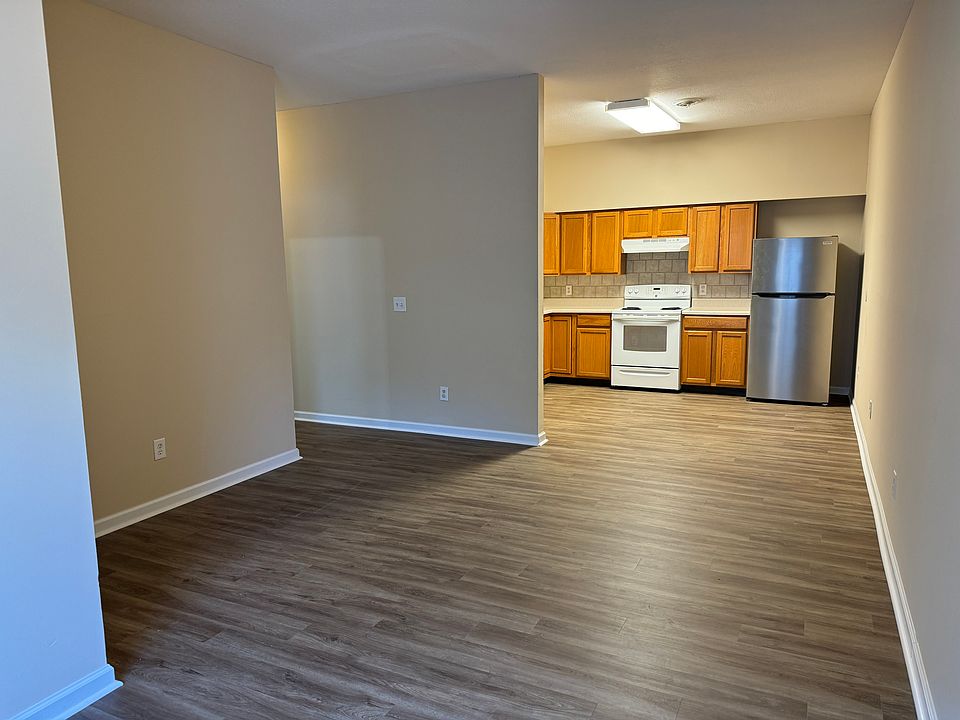Living room looking towards open kitchen