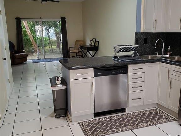 Freshly pained light grey everywhere with white trim.