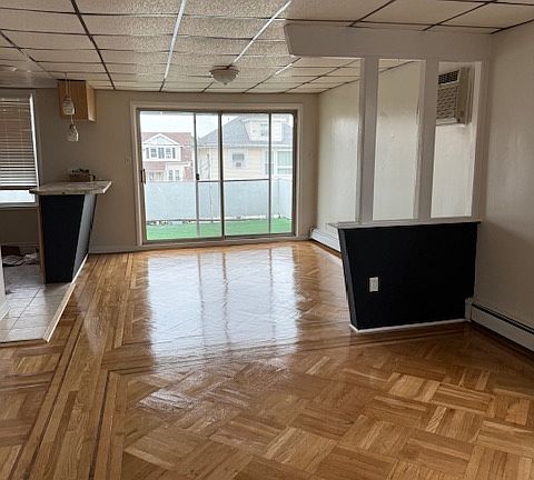 Living, Dining and view to large balcony