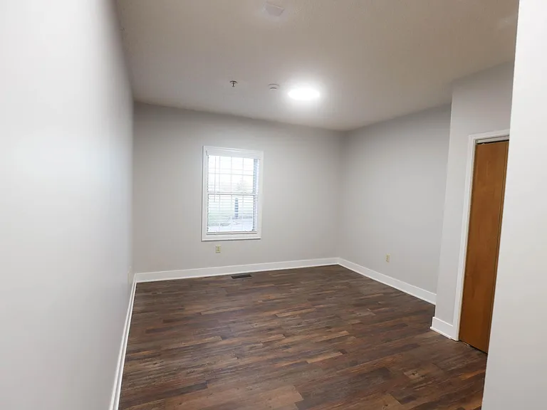 Bedroom 2 is an onsuite, featuring a large walk in closet and a smaller closet. The bathroom has a tub/shower combo.