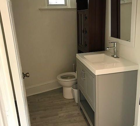 Powder room. Powder room is between the kitchen and dining room.