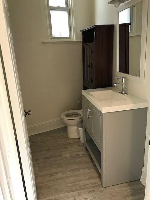 Powder room. Powder room is between the kitchen and dining room.