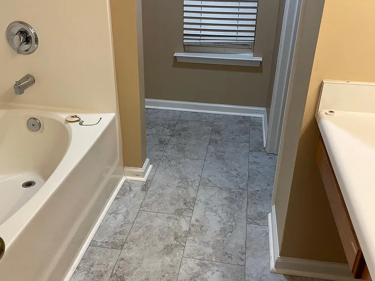 Owner's Bathroom with newly installed floors.