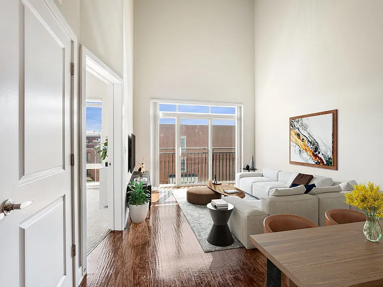 Expansive windows flood your home with natural light, highlighting premium modern textures.