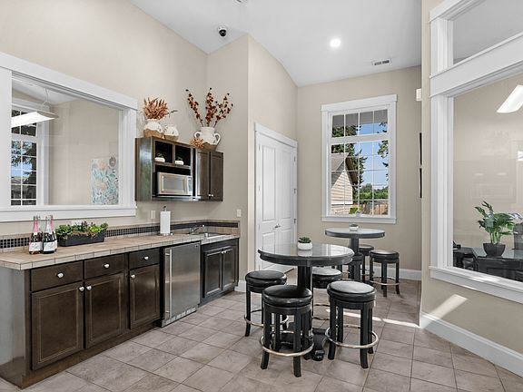 Enjoy the convenience of a fully equipped clubhouse kitchen, perfect for gatherings or community events.