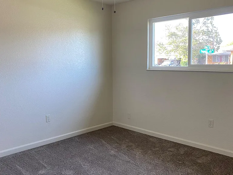 Bedroom, front of house, with fan