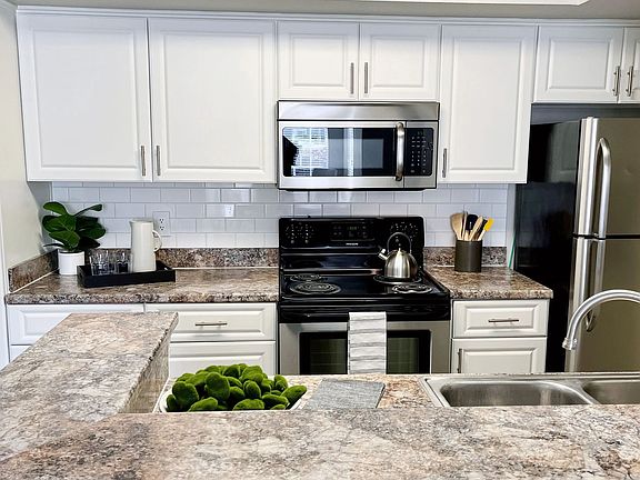 Our kitchens are spacious and stylish, boasting ample storage options, including a built-in pantry.