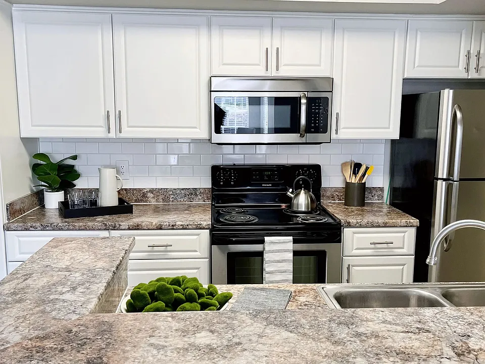Our kitchens are spacious and stylish, boasting ample storage options, including a built-in pantry.