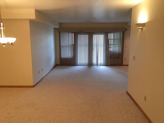 View from main entrance toward dining area on left and living room.