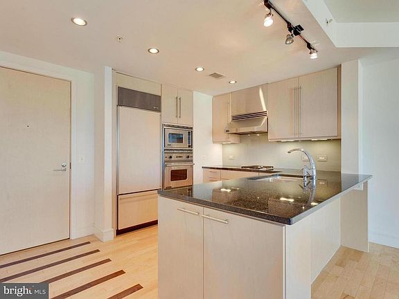 Viking kitchen appliances, Wolf ceramic cooktop, recessed lighting, granite countertops, room for three barstools